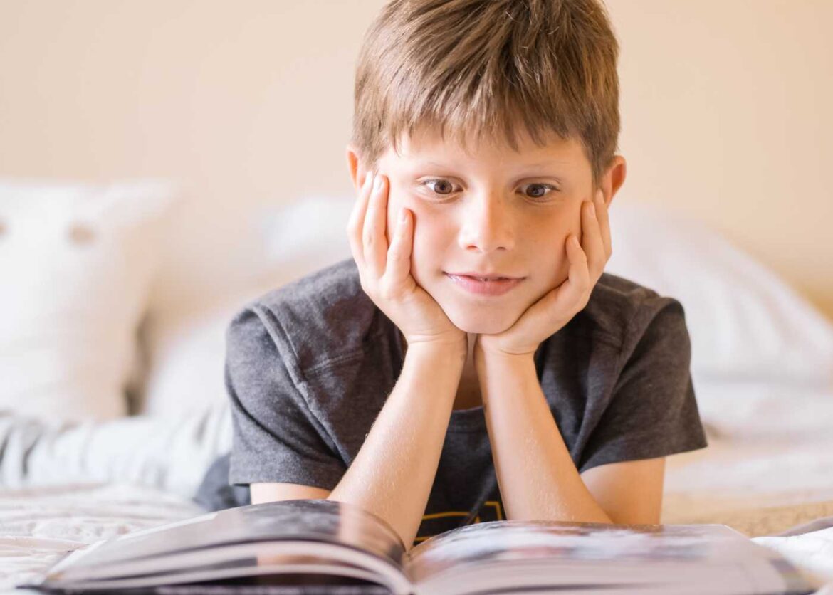 boy reading a book